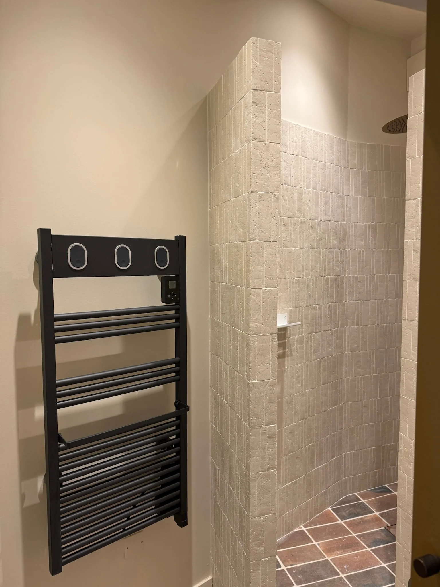 Shower room with black towel rail — Petite Fontaine